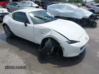 2023 Mazda MX-5 Miata Grand Touring z VIN JM1NDAM71P0560062, wystawiony jako IAAI lot #42065123 z przebiegiem 11 320 mil mil oraz . Historia ofert i sprzedaży dostępna na DreamBid. Obrazek 1.
