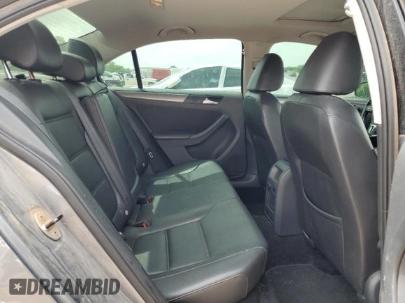 2014 Volkswagen Jetta TDI w/Premium with VIN 3VWLL7AJ7EM313598, listed as a Copart auction lot 54905595 with 162,036 mi miles and Salvage title. Bid and sale history available at DreamBid. Image 10.