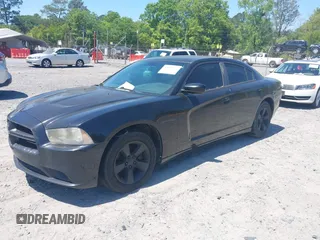 2013 Dodge Charger SE with VIN 2C3CDXBG5DH552376, listed as a IAAI auction lot 42039712 with 233,711 mi miles and . Bid and sale history available at DreamBid. Image 2.