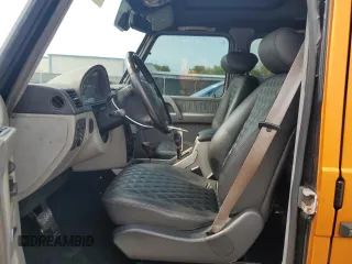 2002 Mercedes-Benz G 500 z VIN WDCYR49E32X128378, wystawiony jako Copart lot #58247305 z przebiegiem Nie podano mil oraz Tytuł czysty. Historia ofert i sprzedaży dostępna na DreamBid. Obrazek 7.