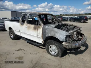 1999 Ford F-150 XL с VIN 1FTRX18L8XNB11044, выставлен на аукционе Copart как лот 75666974 с пробегом Не указан миль и На запчасти • Non repairable. История ставок и продаж доступна на DreamBid. Изображение 4.
