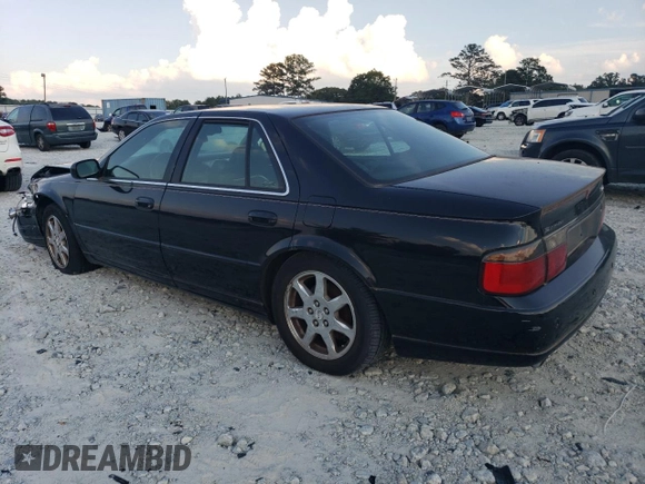 2001 Cadillac Seville Touring STS z VIN 1G6KY549X1U282930, wystawiony jako Copart lot #72750504 z przebiegiem Nie podano mil oraz Szkoda całkowita • Salvage title. Historia ofert i sprzedaży dostępna na DreamBid. Obrazek 2.