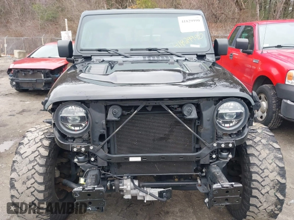 2021 Jeep Gladiator Rubicon z VIN 1C6JJTBG8ML524215, wystawiony jako IAAI lot #41829990 z przebiegiem 62 942 mil mil oraz . Historia ofert i sprzedaży dostępna na DreamBid. Obrazek 13.