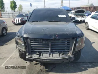 2018 Chevrolet Tahoe LS with VIN 1GNSCAKC9JR201994, listed as a Copart auction lot 53100735 with 182,460 mi miles and Salvage title. Bid and sale history available at DreamBid. Image 5.