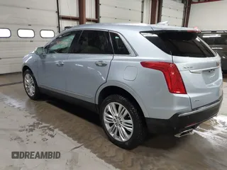 2017 Cadillac XT5 Premium Luxury AWD z VIN 1GYKNERS4HZ306955, wystawiony jako IAAI lot #41932934 z przebiegiem 150 050 mil mil oraz . Historia ofert i sprzedaży dostępna na DreamBid. Obrazek 3.