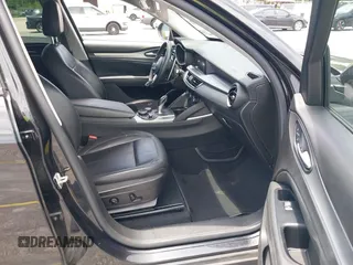 2018 Alfa Romeo Stelvio Sport z VIN ZASFAKPN8J7B58624, wystawiony jako IAAI lot #42380149 z przebiegiem 99 898 mil mil oraz . Historia ofert i sprzedaży dostępna na DreamBid. Obrazek 5.