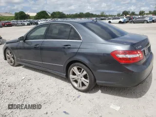 2013 Mercedes-Benz E 350 Luxury with VIN WDDHF5KBXDA769074, listed as a Copart auction lot 64065955 with 208,138 mi miles and Salvage title. Bid and sale history available at DreamBid. Image 2.