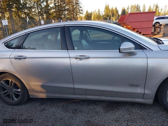 2015 Ford Fusion Energi Titanium with VIN 3FA6P0SU8FR264846, listed as a IAAI auction lot 41552443 with 160,142 mi miles. Bid and sale history available at carsss.com. Image 13.