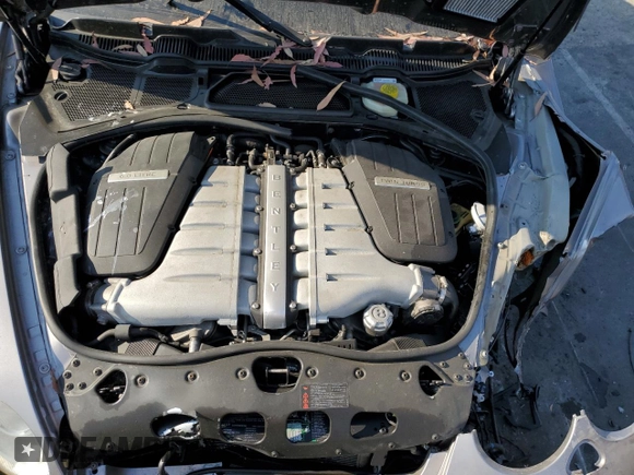 2007 Bentley Continental GT с VIN SCBCR73W77C049977, выставлен на аукционе Copart как лот 62533184 с пробегом Не указан миль и Списание • Salvage title. История ставок и продаж доступна на DreamBid. Изображение 11.