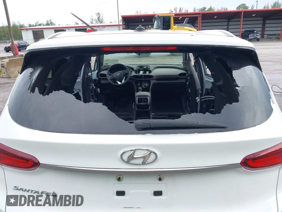 2019 Hyundai Santa Fe SE with VIN 5NMS23ADXKH038506, listed as a IAAI auction lot 42407399 with 54,540 mi miles and . Bid and sale history available at DreamBid. Image 18.