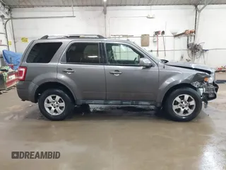 2010 Ford Escape Limited z VIN 1FMCU9EG2AKC17658, wystawiony jako IAAI lot #42430110 z przebiegiem 143 964 mil mil oraz . Historia ofert i sprzedaży dostępna na DreamBid. Obrazek 13.