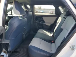 2023 Subaru Solterra Limited with VIN JTMABABA0PA004807, listed as a Copart auction lot 50586815 with 10,879 mi miles and Salvage Title. Bid and sale history available at DreamBid. Image 11.