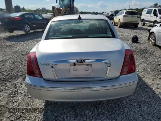2009 Kia Amanti z VIN KNALD225095174024, wystawiony jako Copart lot #72458904 z przebiegiem 239 314 mil mil oraz Szkody całkowita. Historia ofert i sprzedaży dostępna na DreamBid. Obrazek 6.