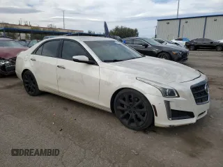 2014 Cadillac CTS Premium RWD z VIN 1G6AT5S30E0142990, wystawiony jako Copart lot #50801685 z przebiegiem 74 583 mil mil oraz Szkody całkowita. Historia ofert i sprzedaży dostępna na DreamBid. Obrazek 4.