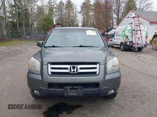 2007 Honda Pilot EX-L with VIN 2HKYF18667H526601, listed as a IAAI auction lot 42182710 with 221,948 mi miles and . Bid and sale history available at carsss.com. Image 13.