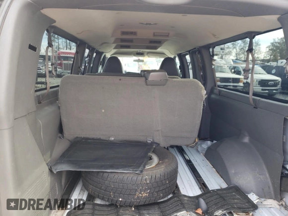 2014 Chevrolet Express Passenger LT with VIN 1GAZG1FG2E1202457, listed as a Copart auction lot 82704884 with 142,982 mi miles and Salvage title. Bid and sale history available at DreamBid. Image 10.