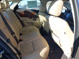 2015 Jaguar XJ with VIN SAJWA1CZ8F8V82299, listed as a IAAI auction lot 40586325 with 1 mi miles. Bid and sale history available at carsss.com. Image 8.