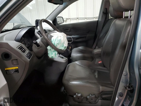 2006 Hyundai Tucson GLS with VIN KM8JN72D36U270643, listed as a Copart auction lot 52848415 with 102,245 mi miles and Salvage Title. Bid and sale history available at carsss.com. Image 7.