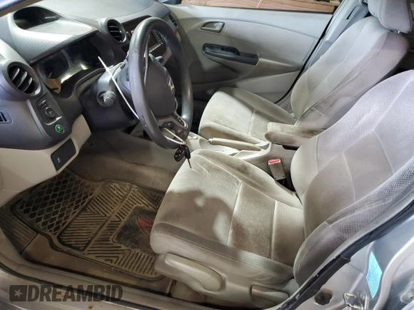 2010 Honda Insight EX with VIN JHMZE2H76AS021610, listed as a Copart auction lot 62992225 with 162,974 mi miles and Salvage title. Bid and sale history available at DreamBid. Image 7.