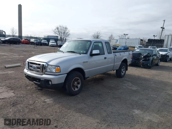 2009 Ford Ranger XLT with VIN 1FTZR45E99PA54930, listed as a IAAI auction lot 41732547 with 87,899 mi miles. Bid and sale history available at carsss.com. Image 2.