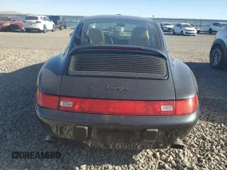 1996 Porsche 911 with VIN WP0DA2996TS385231, listed as a Copart auction lot 83699964 with 60,492 mi miles and Salvage title. Bid and sale history available at DreamBid. Image 6.