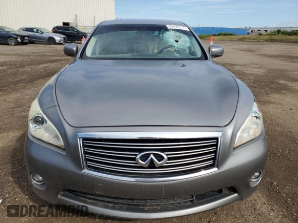 2011 Infiniti M with VIN JN1BY1ARXBM370844, listed as a Copart auction lot 62425515 with 277,315 mi miles and Salvage title. Bid and sale history available at DreamBid. Image 5.