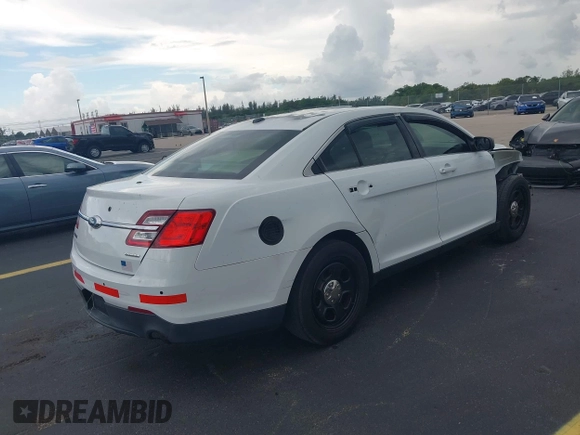 2015 Ford Police Interceptor with VIN 1FAHP2L83FG149326, listed as a IAAI auction lot 42477215 with 90,679 mi miles and . Bid and sale history available at DreamBid. Image 4.