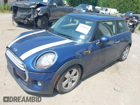 2014 MINI Hardtop with VIN WMWXM5C50ET972174, listed as a IAAI auction lot 42738144 with 106,273 mi miles and . Bid and sale history available at DreamBid. Image 2.