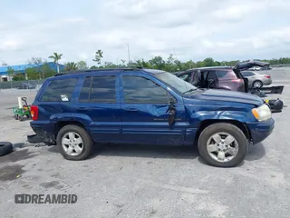 2001 Jeep Grand Cherokee Limited with VIN 1J4GX58S01C657436, listed as a IAAI auction lot 42102133 with 194,897 mi miles and . Bid and sale history available at DreamBid. Image 12.
