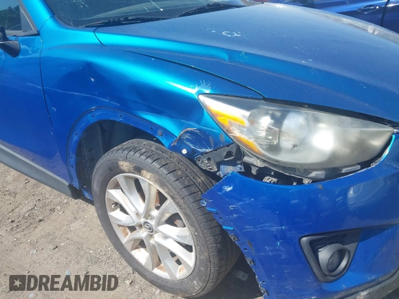 2013 Mazda CX-5 Grand Touring with VIN JM3KE2DEXD0123314, listed as a IAAI auction lot 42064266 with 288,935 mi miles. Bid and sale history available at carsss.com. Image 6.