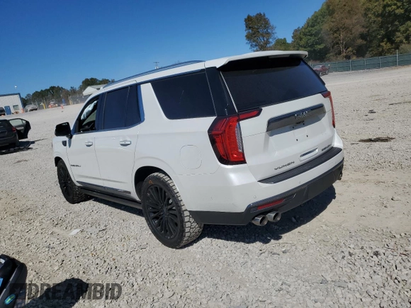 2023 GMC Yukon Denali Ultimate with VIN 1GKS2EKL0PR132029, listed as a Copart auction lot 77234034 with 58,071 mi miles and Salvage Title. Bid and sale history available at carsss.com. Image 2.