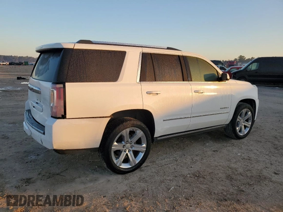 2019 GMC Yukon Denali with VIN 1GKS1CKJ6KR122376, listed as a Copart auction lot 85943414 with 90,614 mi miles and Salvage Title. Bid and sale history available at carsss.com. Image 3.