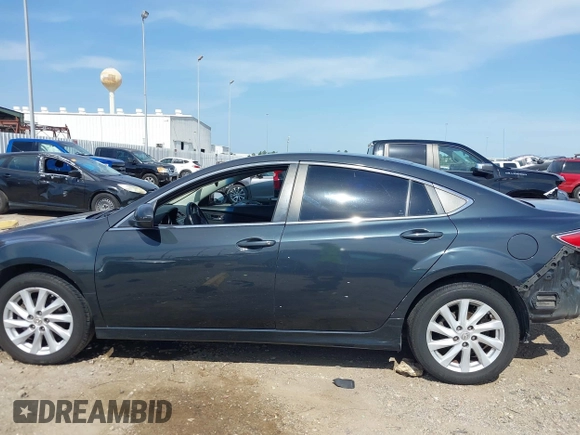 2012 Mazda 6 i Touring with VIN 1YVHZ8DH7C5M29077, listed as a IAAI auction lot 42236370 with 193,258 mi miles and . Bid and sale history available at DreamBid. Image 15.