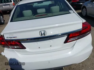 2014 Honda Civic LX z VIN 19XFB2F50EE049880, wystawiony jako IAAI lot #42042404 z przebiegiem 98 304 mil mil oraz . Historia ofert i sprzedaży dostępna na DreamBid. Obrazek 16.