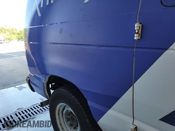 2012 Ford Econoline Cargo Commercial with VIN 1FTNE2EL9CDB21032, listed as a IAAI auction lot 42787135 with 106,406 mi miles and . Bid and sale history available at DreamBid. Image 34.
