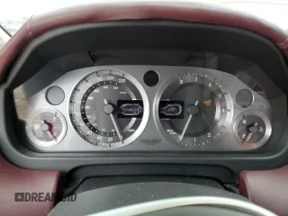 2005 Aston Martin DB9 z VIN SCFAD01A15GA00012, wystawiony jako Copart lot #65919164 z przebiegiem Nie podano mil oraz Szkody całkowita. Historia ofert i sprzedaży dostępna na DreamBid. Obrazek 9.