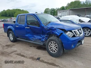 2014 Nissan Frontier SV with VIN 1N6AD0EV5EN720348, listed as a IAAI auction lot 42178280 with 98,223 mi miles and . Bid and sale history available at DreamBid. Image 1.