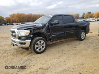 2024 Ram 1500 Big Horn with VIN 1C6RRFFG4RN209348, listed as a Copart auction lot 82674864 with 21,749 mi miles and Salvage title. Bid and sale history available at DreamBid. Image 1.