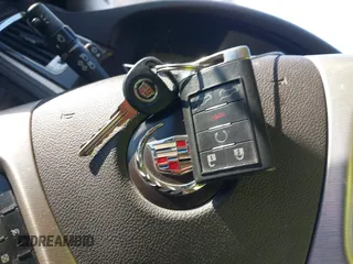 2013 Cadillac Escalade ESV Platinum Edition z VIN 1GYS4KEF2DR153626, wystawiony jako IAAI lot #42269429 z przebiegiem 252 875 mil mil oraz . Historia ofert i sprzedaży dostępna na DreamBid. Obrazek 11.