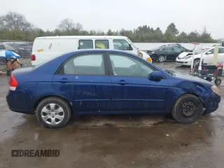 2009 Kia Spectra LX z VIN KNAFE221X95619246, wystawiony jako IAAI lot #41739339 z przebiegiem Nie podano mil oraz . Historia ofert i sprzedaży dostępna na DreamBid. Obrazek 13.