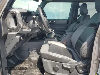 2023 Ford Bronco with VIN 1FMEE5BP3PLC01720, listed as a Copart auction lot 56186505 with 14,229 mi miles and Salvage title. Bid and sale history available at DreamBid. Image 7.