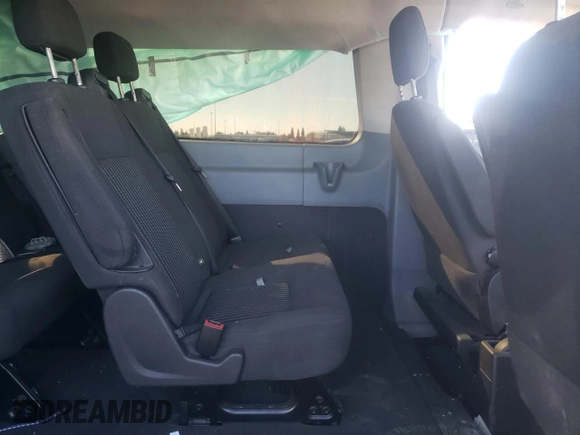 2016 Ford Transit Wagon XL with VIN 1FMZK1YM9GKB28861, listed as a Copart auction lot 77015814 with 111,384 mi miles and Salvage Title. Bid and sale history available at carsss.com. Image 11.
