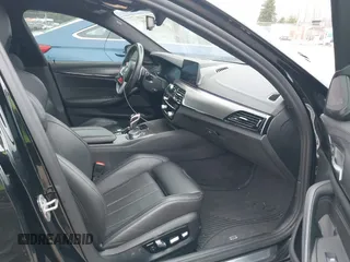 2020 BMW M5 Competition z VIN WBSJF0C08LCD72764, wystawiony jako IAAI lot #41739116 z przebiegiem 36 013 mil mil oraz . Historia ofert i sprzedaży dostępna na DreamBid. Obrazek 5.