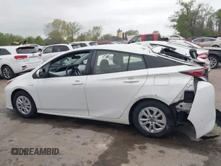 2017 Toyota Prius Two with VIN JTDKBRFUXH3036063, listed as a IAAI auction lot 42036676 with 202,873 mi miles. Bid and sale history available at carsss.com. Image 14.