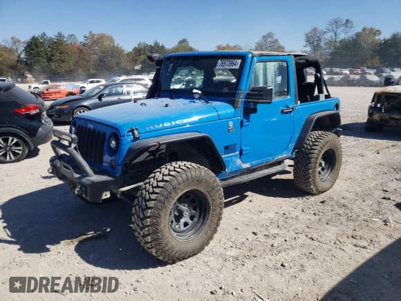 2011 Jeep Wrangler Rubicon with VIN 1J4BA6D15BL563410, listed as a Copart auction lot 76973964 with 68,334 mi miles and Salvage title. Bid and sale history available at DreamBid. Image 1.