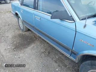 1991 Oldsmobile Cutlass Ciera z VIN 1G3AM54N3M6309525, wystawiony jako IAAI lot #42261904 z przebiegiem 121 774 mil mil oraz . Historia ofert i sprzedaży dostępna na DreamBid. Obrazek 16.