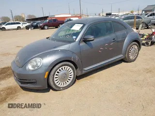 2014 Volkswagen Beetle 2.5L with VIN 3VWJX7AT7EM608634, listed as a IAAI auction lot 41783090 with 139,106 mi miles and . Bid and sale history available at DreamBid. Image 17.
