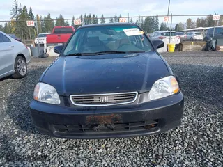 1997 Honda Civic EX with VIN 2HGEJ8542VH520783, listed as a IAAI auction lot 40744085 with 155,772 mi miles. Bid and sale history available at carsss.com. Image 12.