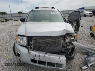 2009 Ford Escape XLS z VIN 1FMCU92789KB10338, wystawiony jako Copart lot #57452495 z przebiegiem 285 171 mil mil oraz Szkoda całkowita • Salvage title. Historia ofert i sprzedaży dostępna na DreamBid. Obrazek 5.