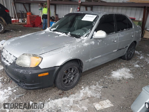 2005 Hyundai Accent GLS with VIN KMHCG45C75U656548, listed as a IAAI auction lot 41553603 with 178,070 mi miles. Bid and sale history available at carsss.com. Image 2.